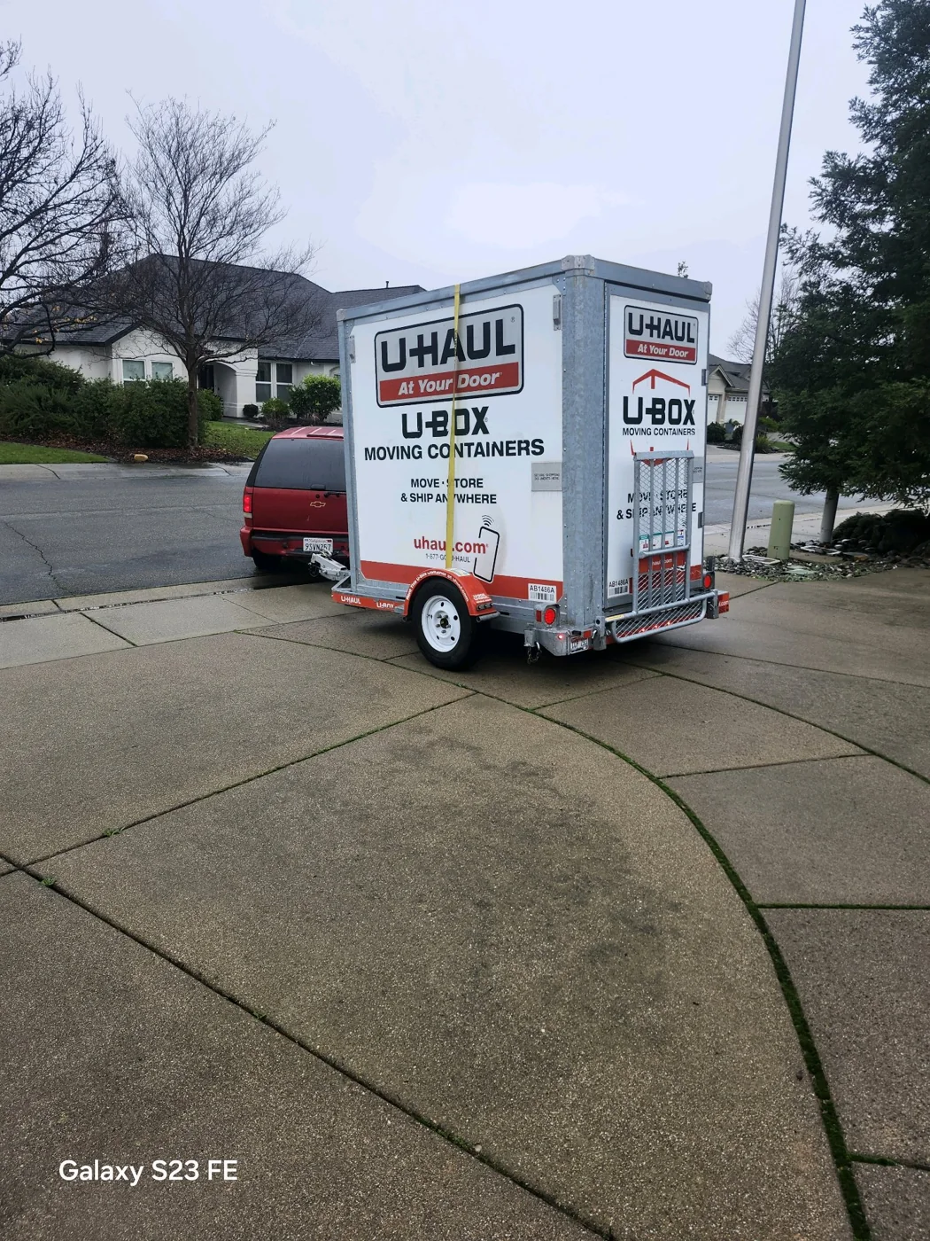 U-Box container on a trailer at a Rowann Tree Helping Hands job